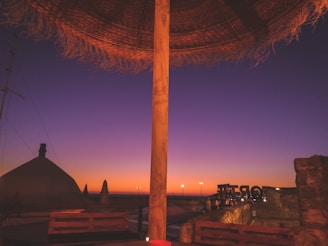 Evening view of a completed wooden grandstand set up in a residential garden