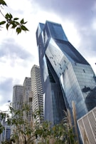 a very tall building in the middle of a city