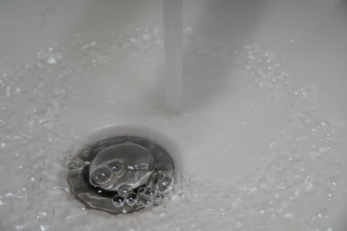 Water flowing in sink in Muscat