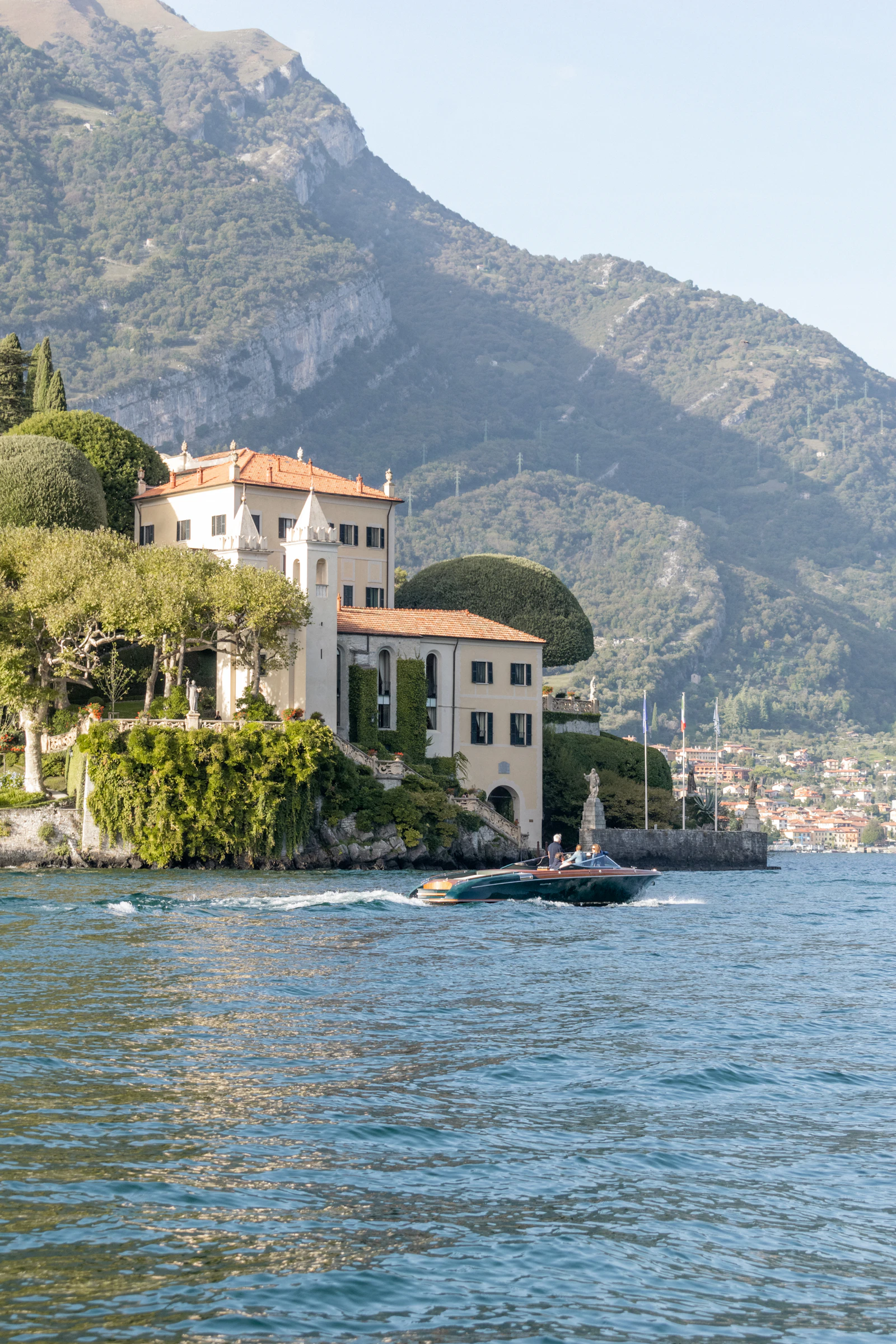 Luxury lakeside home overlooking water with a retreat-style setting