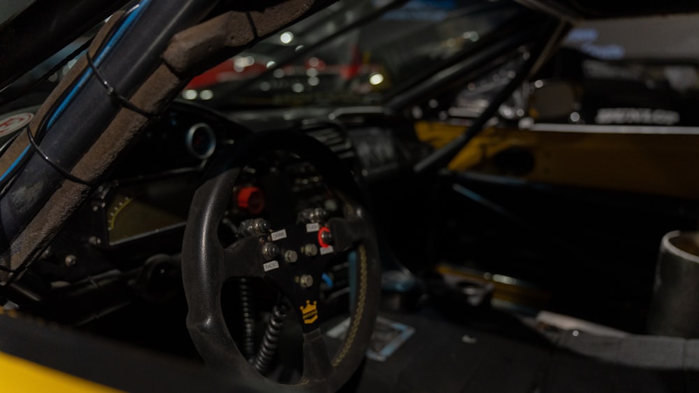 a close up of a steering wheel on a race car