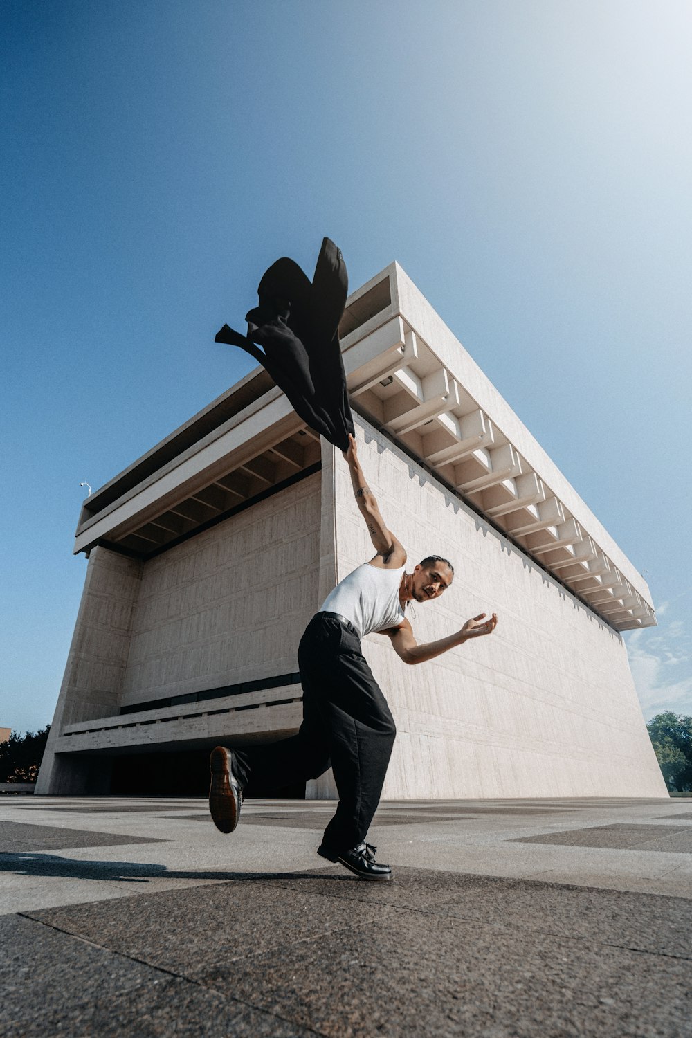 a man is doing a trick on a skateboard