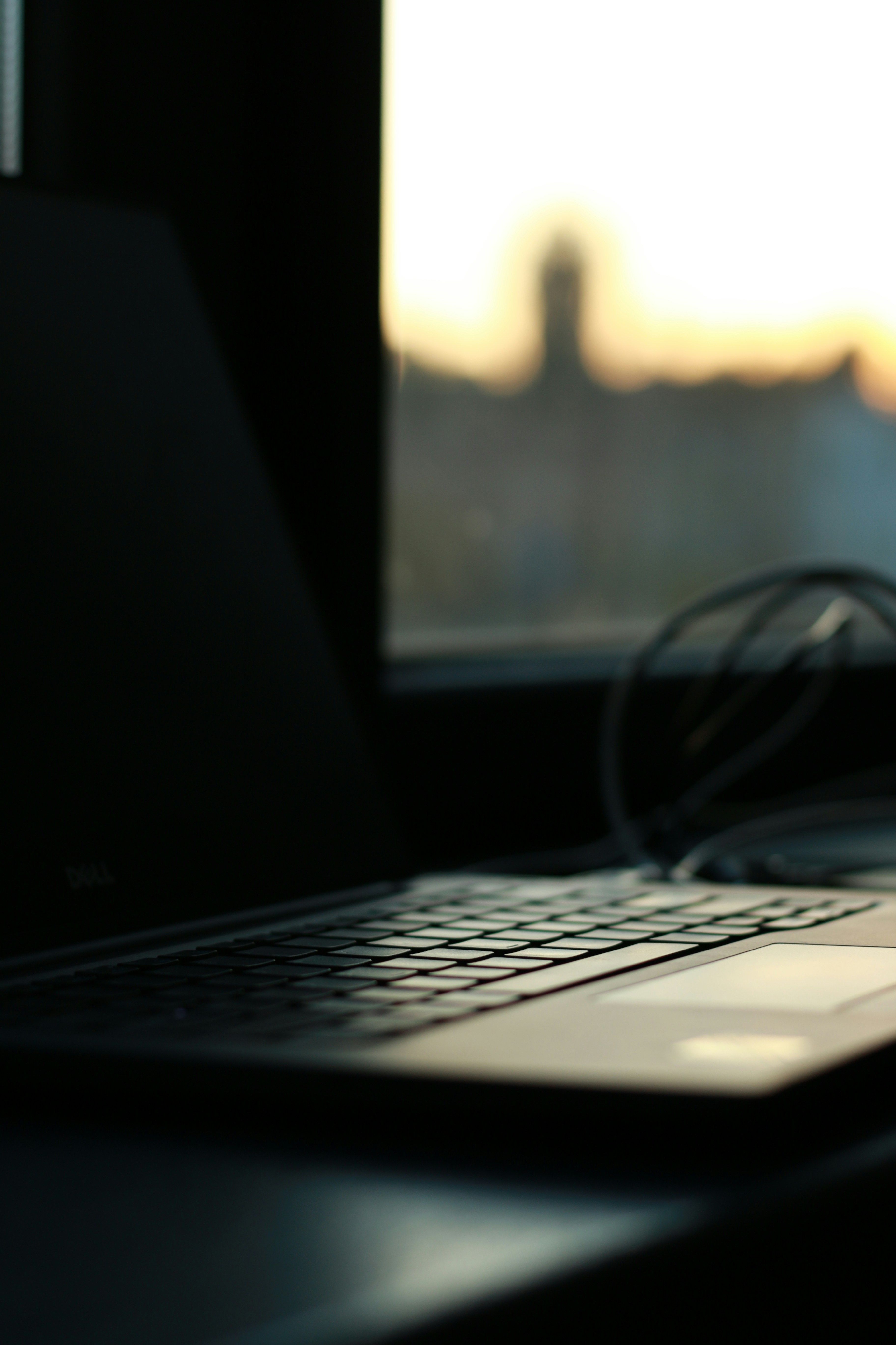 a laptop computer sitting on top of a desk