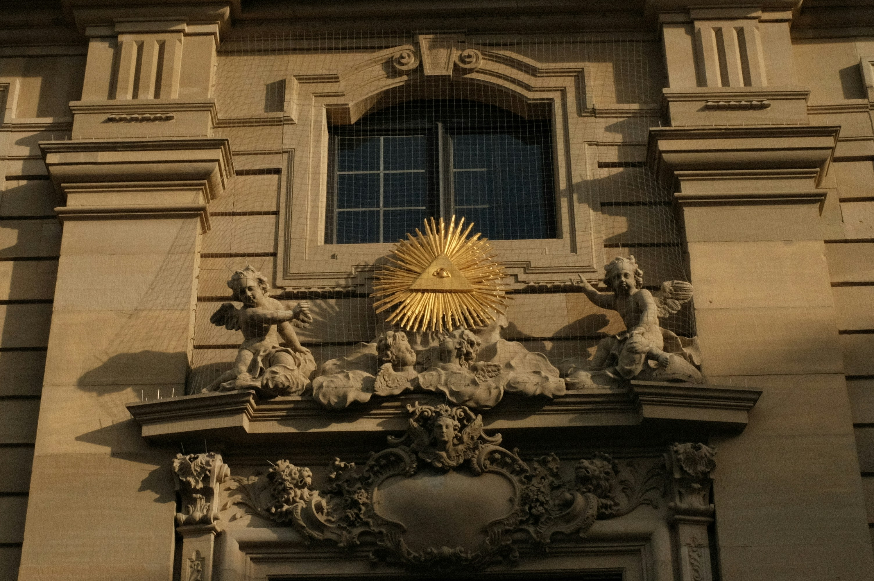 a large building with a clock on the front of it