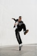 a man is doing a trick on a skateboard