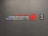 A textured wall featuring the logos and text for Air Canada Maple Leaf Lounge and Star Alliance Gold. The text includes bilingual English and French, with the Air Canada logo prominently displayed in red next to a stylized maple leaf.
