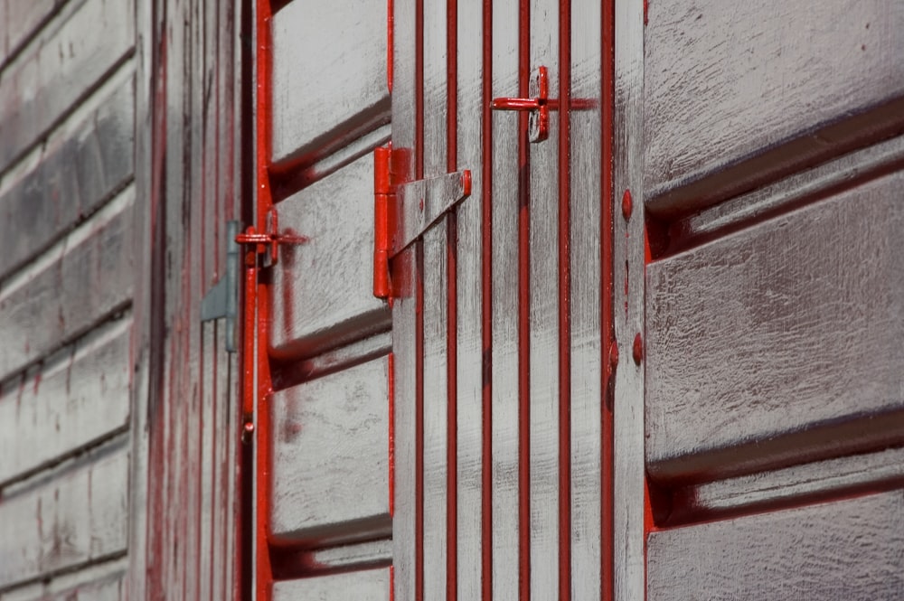a close up of a metal door on a building