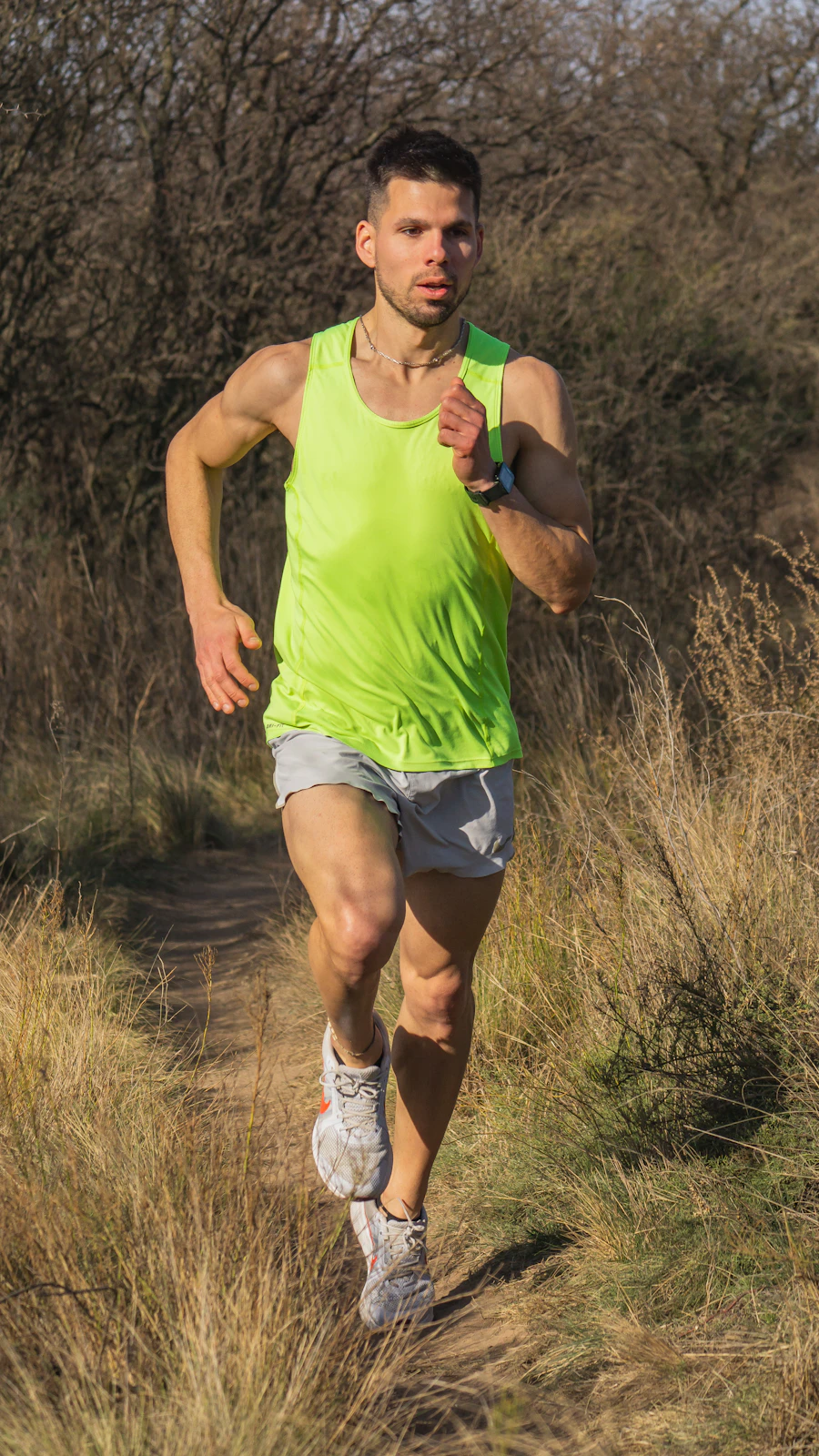 Athletic male trail runner outdoors