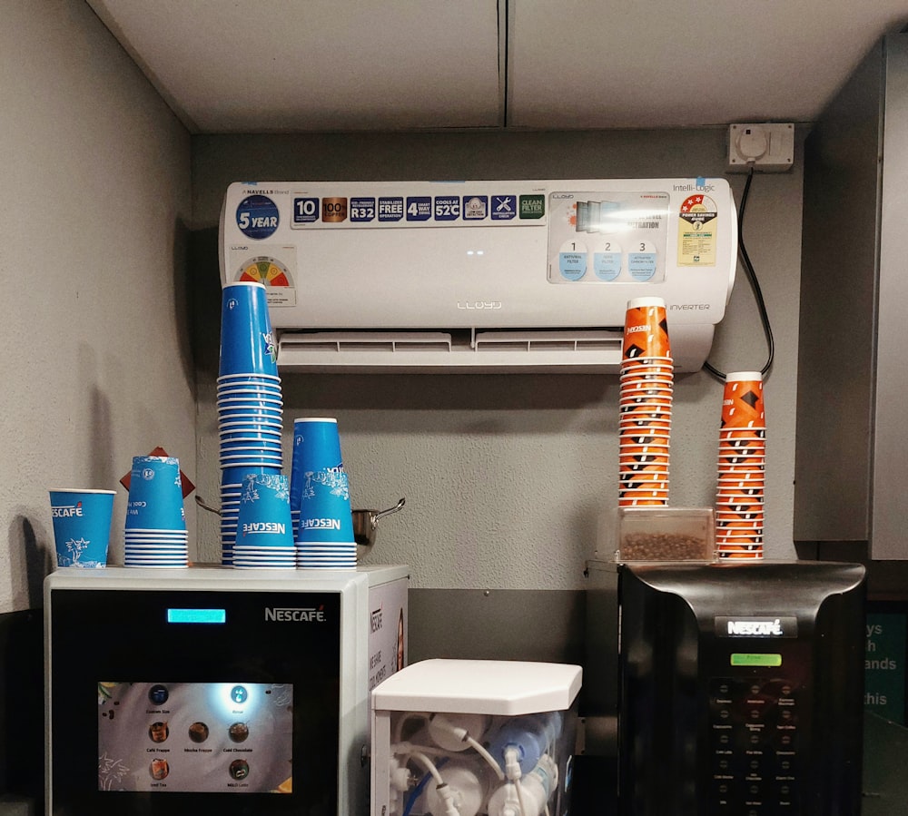 a microwave oven sitting next to a coffee maker