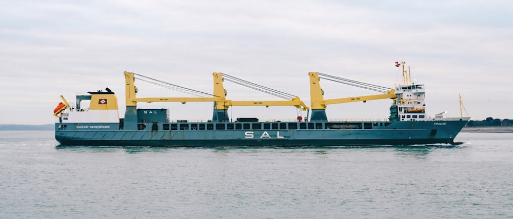 a large boat floating on top of a body of water