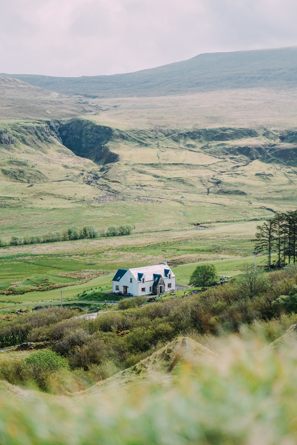 a house in the middle of a field