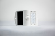 A close-up of a solar LED wall lamp showcasing its design.