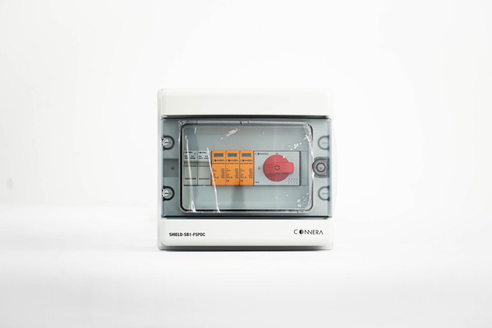 a white microwave oven sitting on top of a table