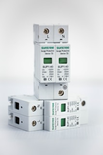 three surge breakers stacked on top of each other