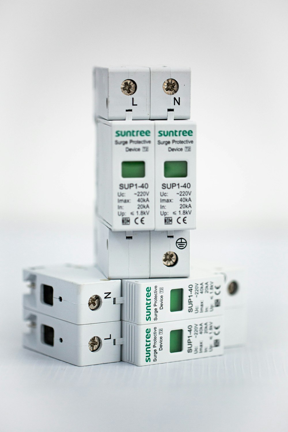three surge breakers stacked on top of each other
