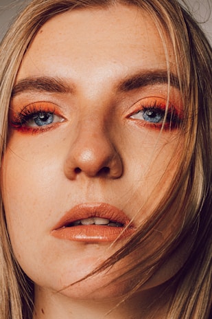 A close-up portrait of a model from Santa Ana, highlighting natural beauty and expressive eyes.