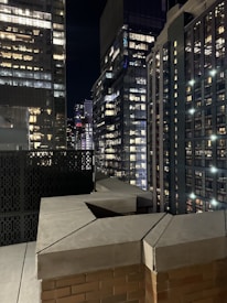 Elegant city apartment with night view overlooking a vibrant European skyline.