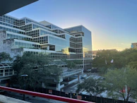 Exterior view of the Estructiva corporate headquarters at sunset.