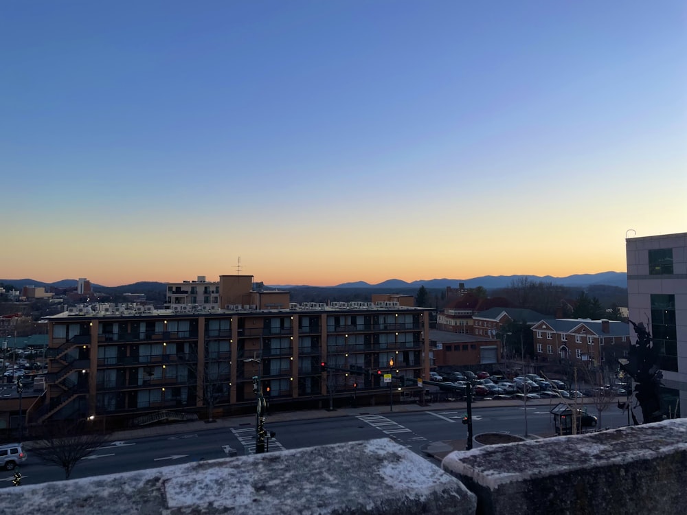 a view of a city with mountains in the background