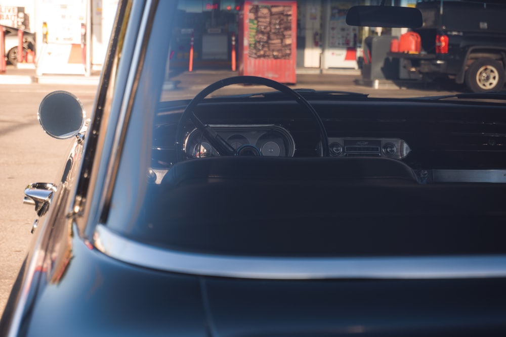 the interior of a car with a steering wheel