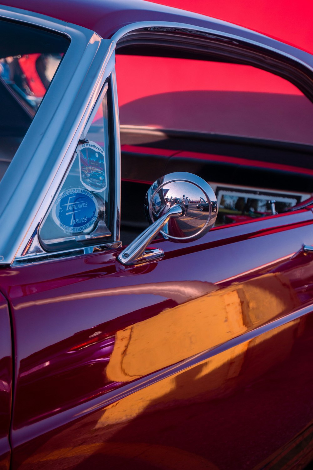 a close up of a car's side mirror