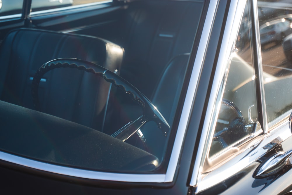 the interior of a car with a steering wheel