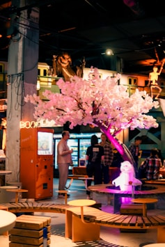 An engaging language fun learning session with creators surrounded by sakura-themed decor.