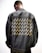 A person is wearing a denim jacket adorned with a pattern of yellow and white cursive letters. The individual is photographed from behind, highlighting the jacket's design against a plain white background.