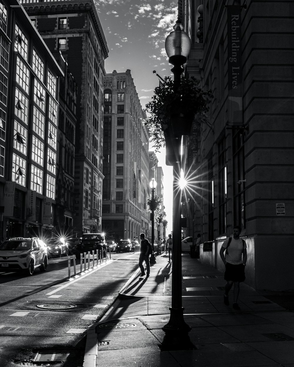 a black and white photo of a city street