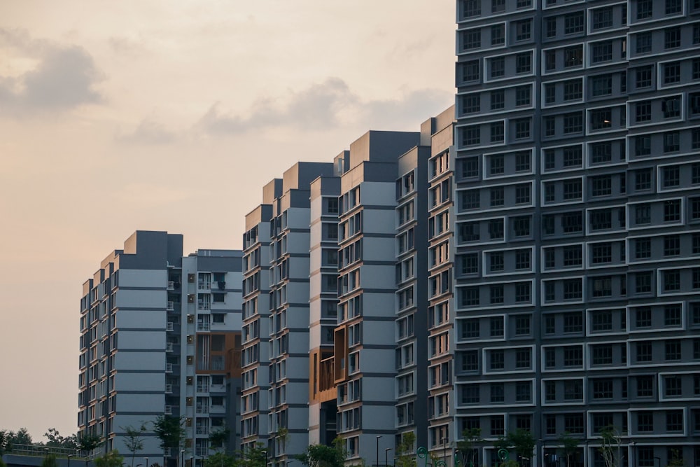 a group of tall buildings sitting next to each other