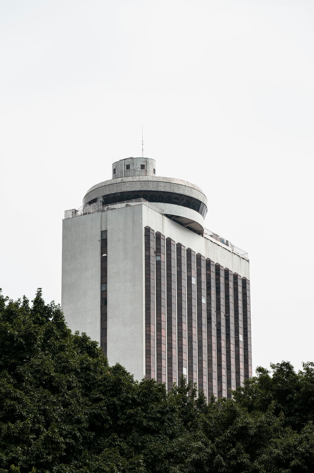 a tall building with a dome on top of it
