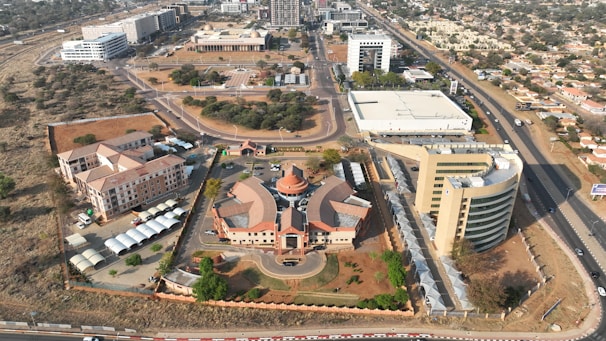 Aerial view of residential and commercial properties in an urban area.