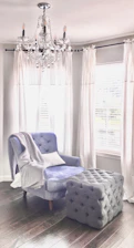 Elegant upholstered armchair with classic fabric in a softly lit room