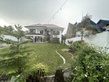 A modern house with a well-maintained garden.