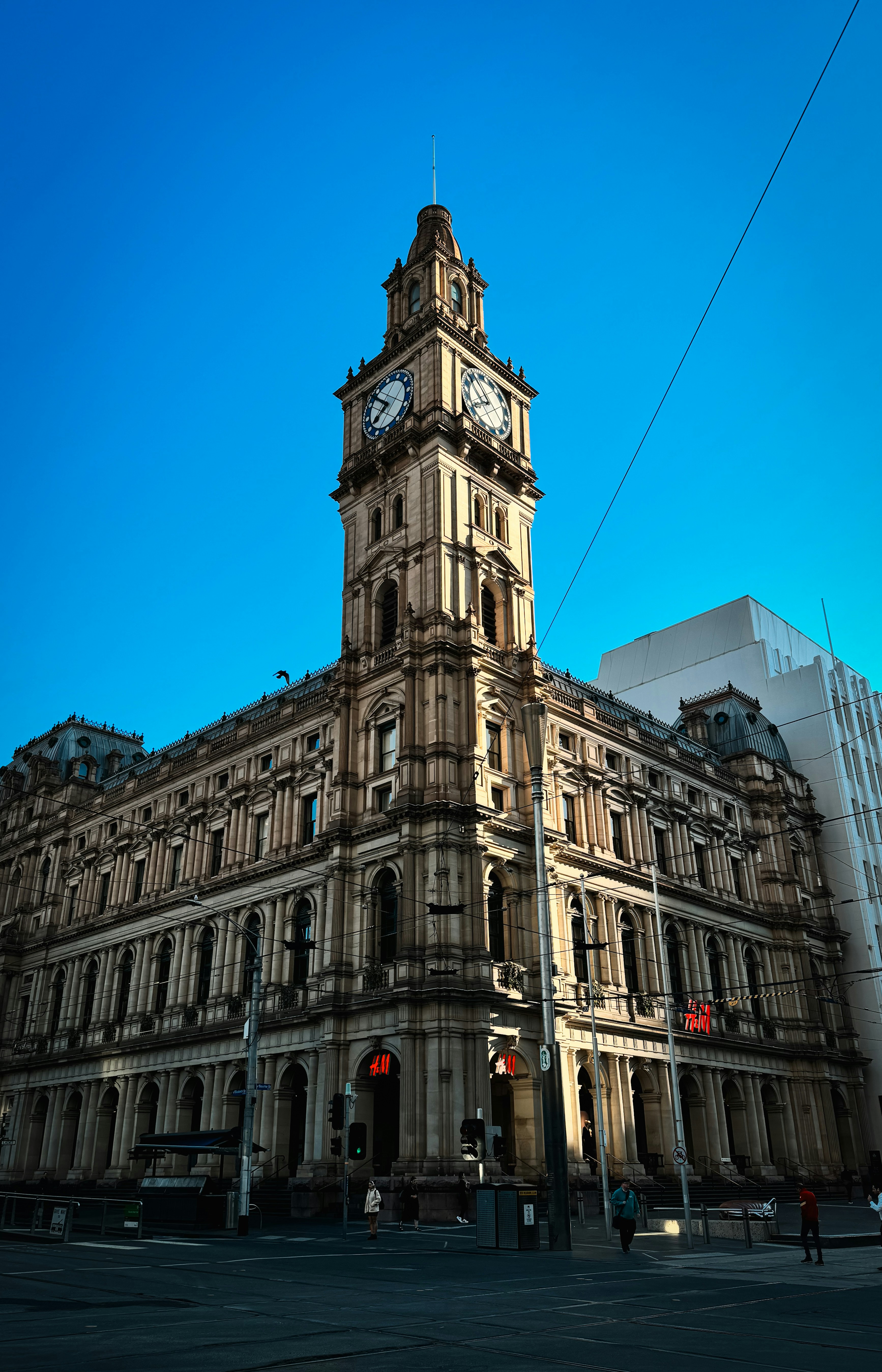 a large building with a clock on the top of it