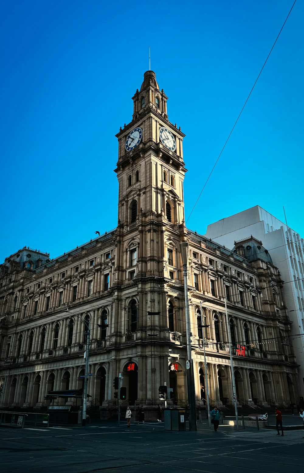 a large building with a clock on the top of it