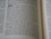 The image displays a close-up view of an open book, featuring a text layout in two columns with numbers indicating sections or verses. The page contains words that are clearly related to a religious text, mentioning terms like 'Sovereign LORD' and 'Israel'. The typography is traditional, suggesting a formal document.