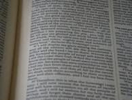 Close-up of an ancient text being digitized with modern scanning equipment.