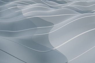 Gentle, flowing curves create an abstract and calming pattern, reminiscent of smooth waves. The soft, muted colors enhance the tranquil and serene aesthetic.