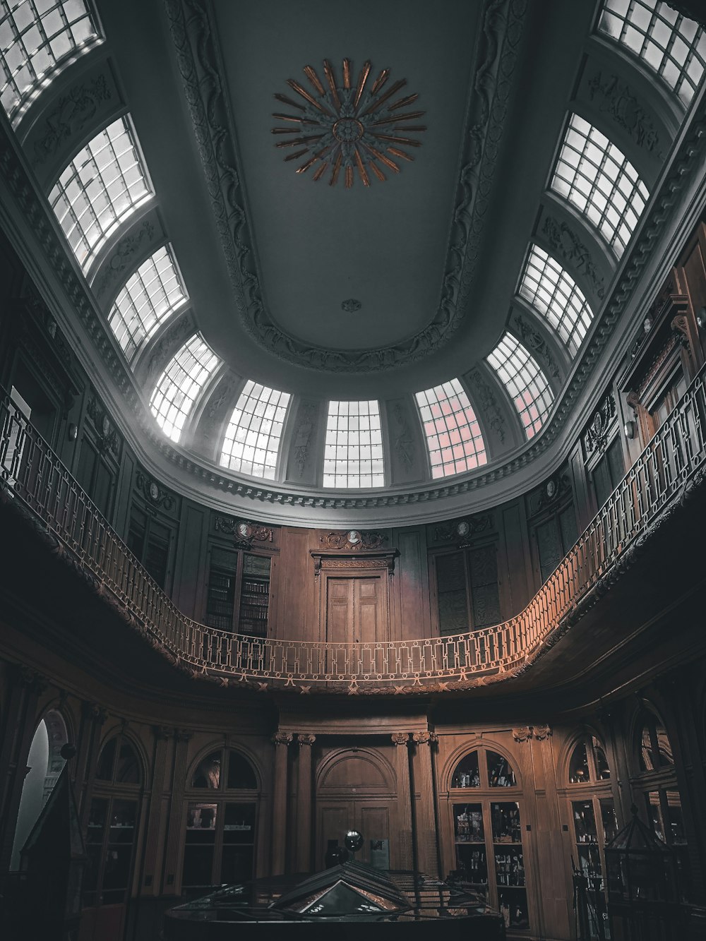 a large building with a chandelier hanging from the ceiling