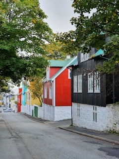 A vibrant neighborhood street lined with charming houses.