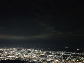 Visual of a glowing data network overlaying a city skyline symbolizing deep analytics.