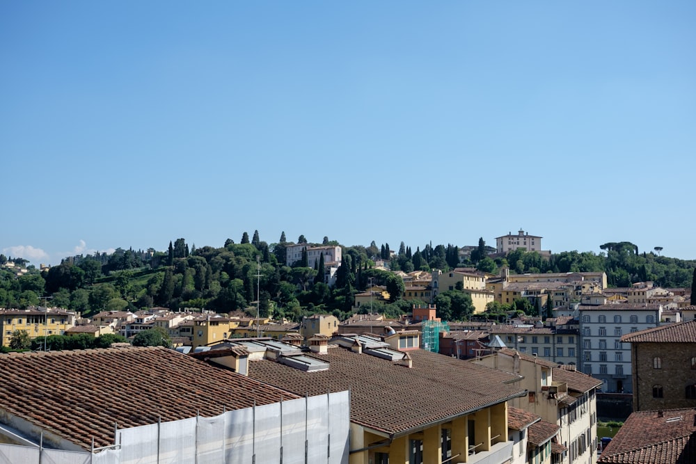 a view of a city with buildings and trees