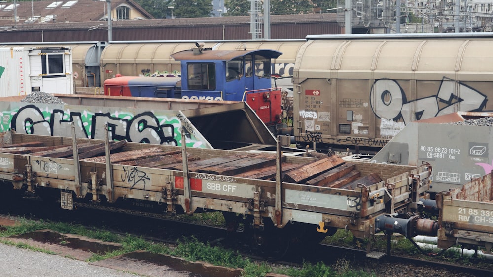 a train car that has graffiti on the side of it