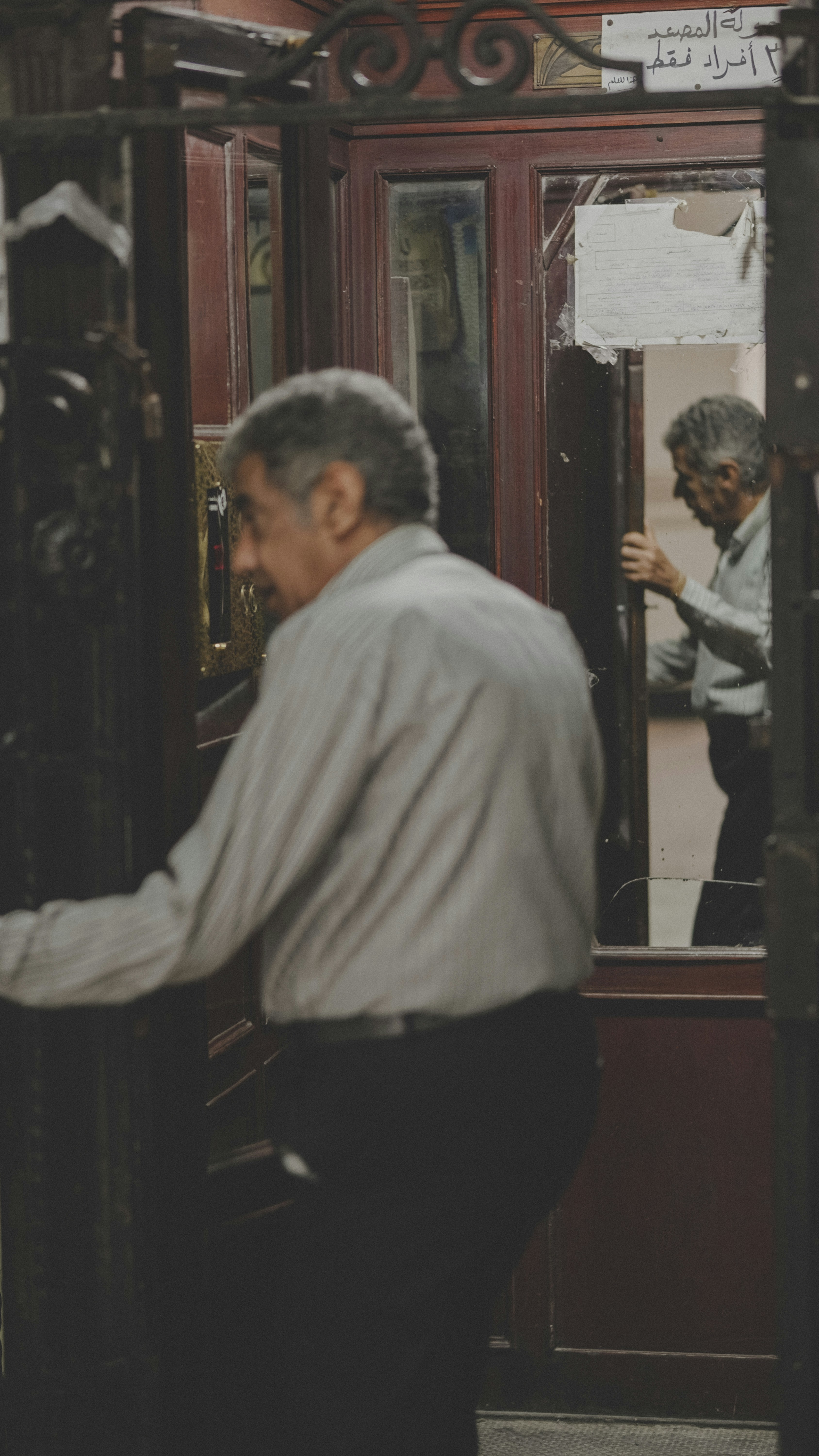 a man standing in front of a doorway