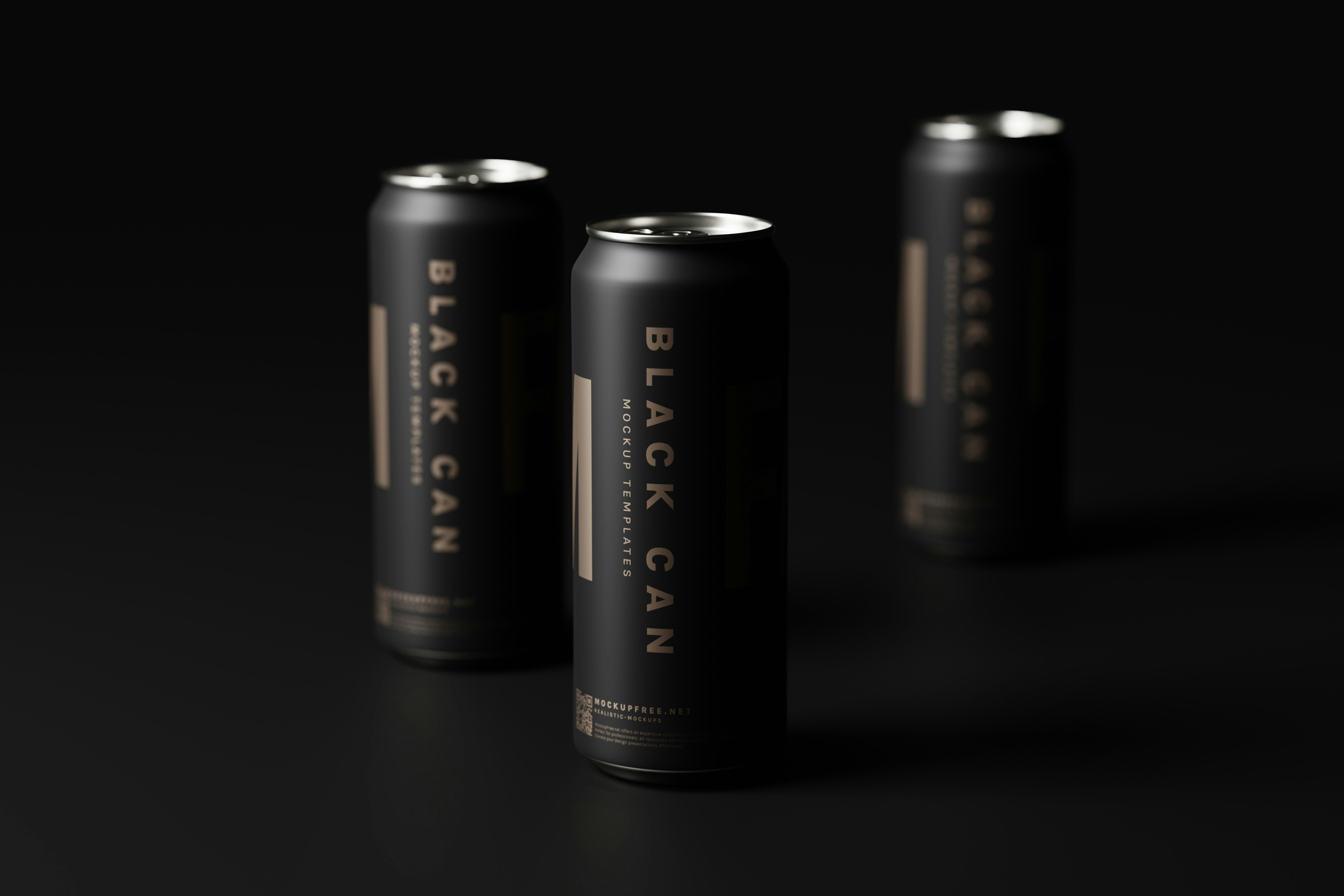 three cans of energy drink on a black surface