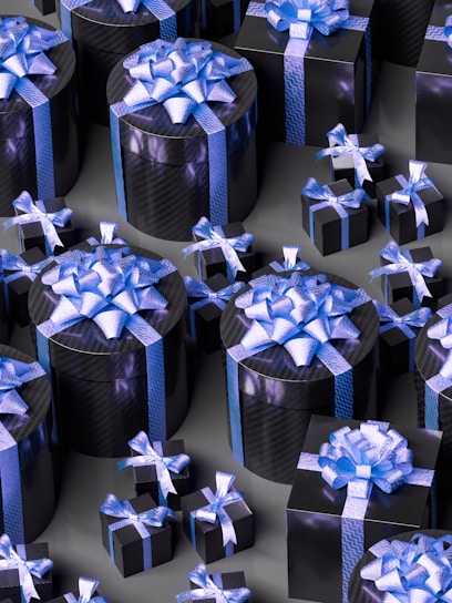 a group of black boxes with blue bows