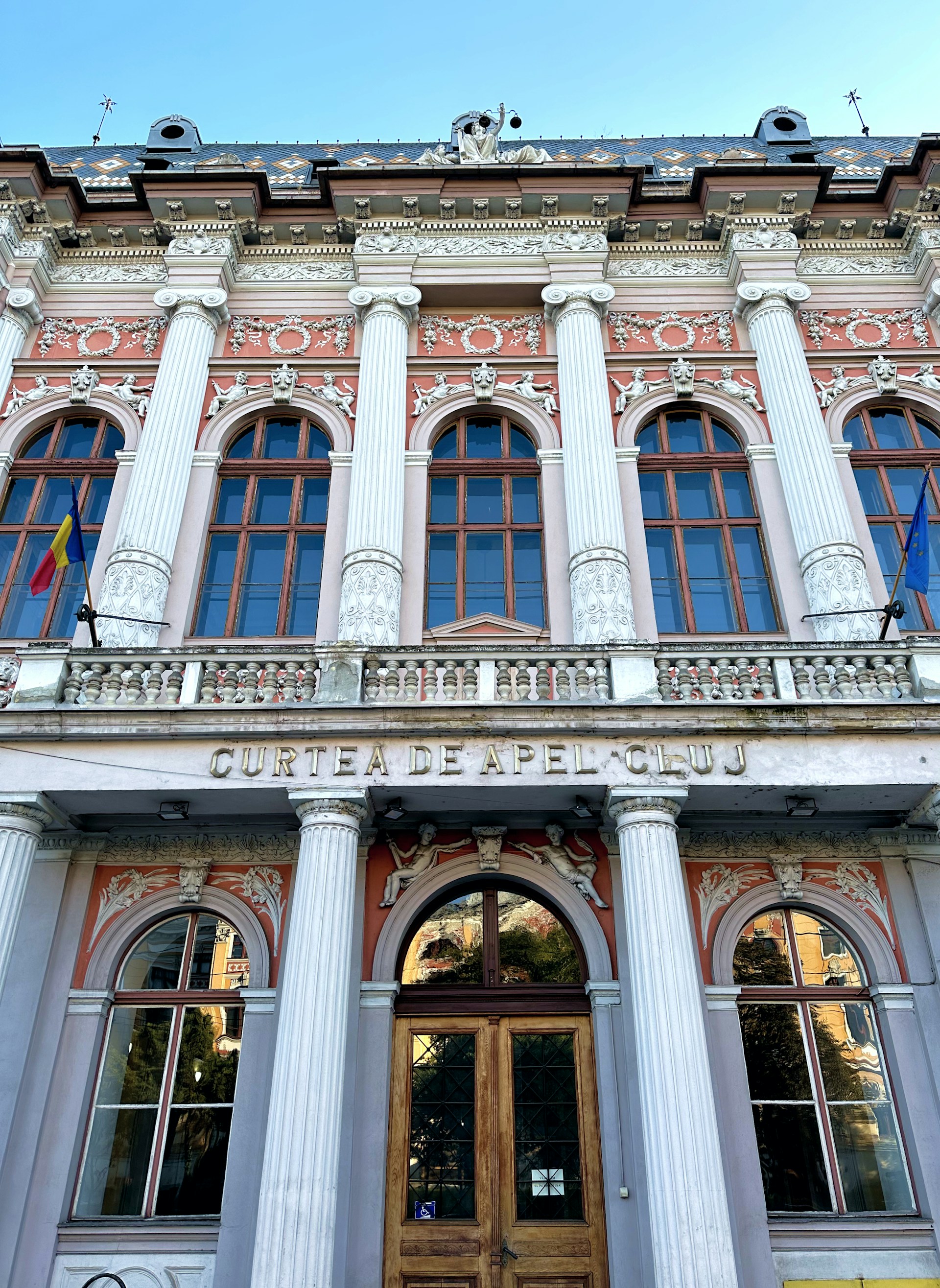 woman wearing yellow long-sleeved dress under white clouds and blue sky during daytime