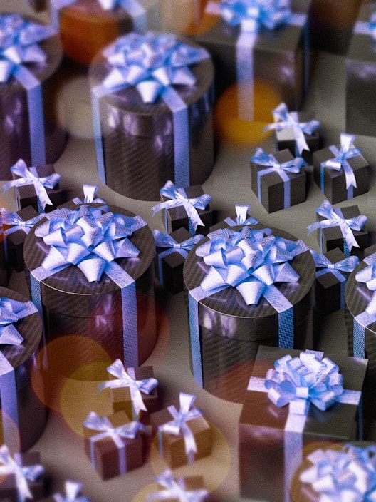 A neatly arranged display of colorful gift boxes on a wooden table