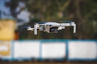 A precision camera mount attached to a drone, ready for flight.